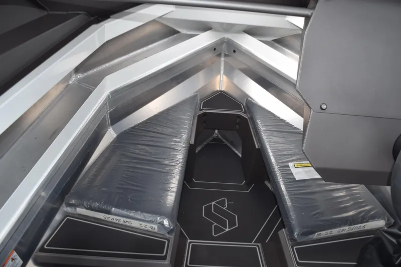 Slide: The Image of 2026 Stabicraft 1850 Supercab Sportfish interior with cushioned seating and sleek design. - 10