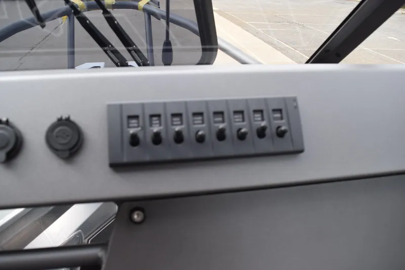 Slide: The Image of Dashboard controls of 2026 Stabicraft 1850 Supercab Sportfish boat. - 11