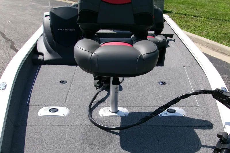 Slide: The Image of 2025 Tracker Pro Team 175 Crappie Edition boat with swivel seat and carpeted deck. - 4