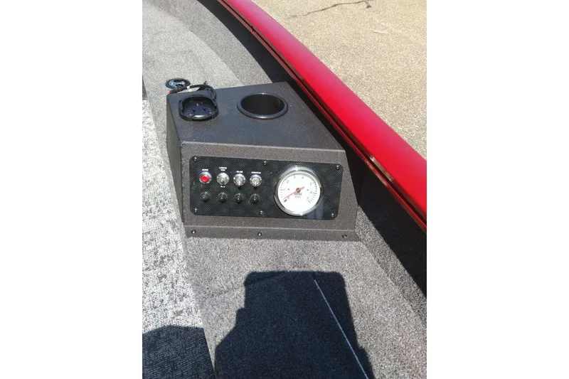 Slide: The Image of Control panel of 2025 Tracker Super Guide V-16 T boat with gauges and switches. - 3