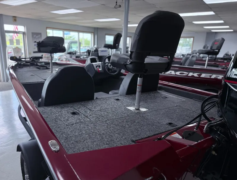 Slide: The Image of 2025 Tracker Pro Team 175 boat interior with seating and control console. - 5
