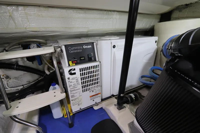 Slide: The Image of Cummins Onan generator in 2020 Tiara Yachts 43 Open engine room. - 22