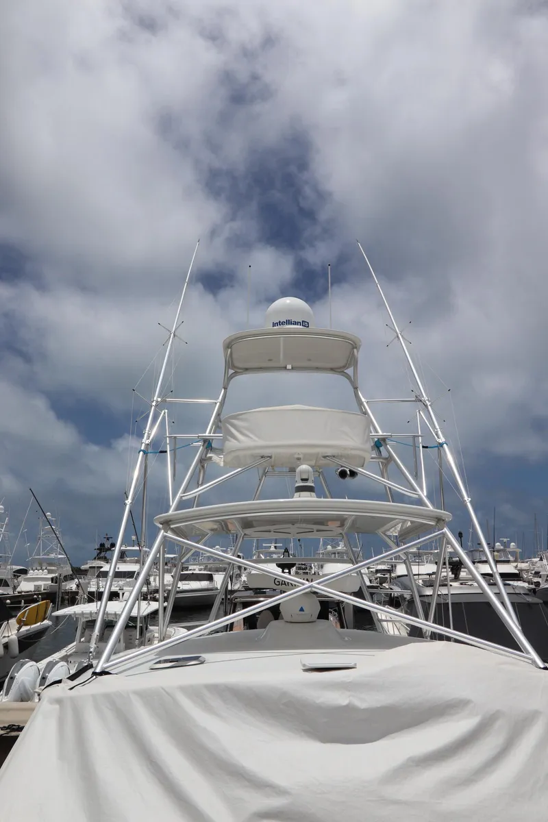 Slide: The Image of 2020 Tiara Yachts 43 Open at marina, featuring sleek design and advanced equipment. - 29