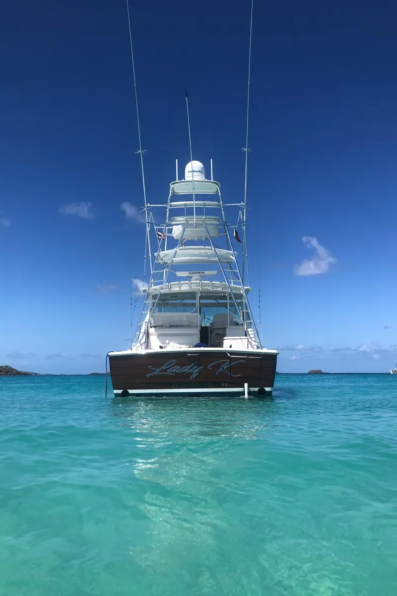 Slide: The Image of 2020 Tiara Yachts 43 Open in clear turquoise waters under a bright blue sky. - 36