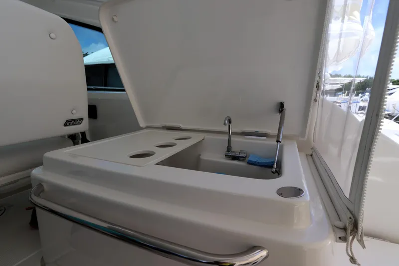 Slide: The Image of Tiara Yachts 43 Open 2020 model with onboard sink and storage area. - 9
