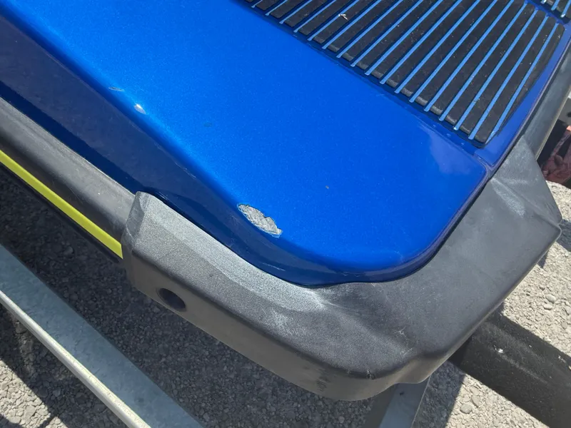 Slide: The Image of Close-up of a 2019 Yamaha WaveRunner EXR with minor hull damage. - 3