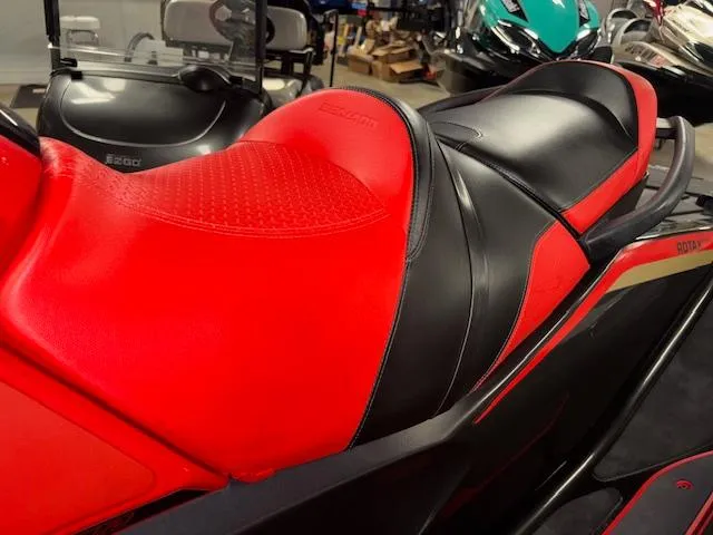 Slide: The Image of 2019 Sea-Doo RXTX jet ski with vibrant red and black seat design. - 6