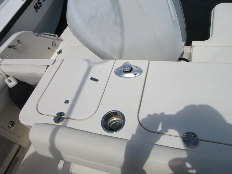 Slide: The Image of 2019 Grady-White Fisherman 236 boat deck with storage compartments and seating. - 27