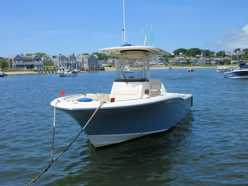Slide: The Image of 2019 Grady-White Fisherman 236 boat anchored in a scenic harbor. - 4