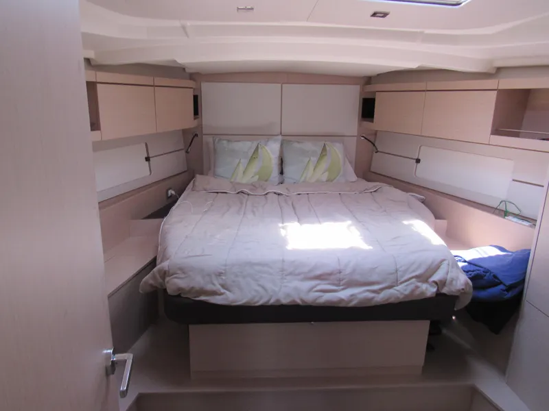 Slide: The Image of Interior cabin of 2020 Beneteau Oceanis 46.1 yacht with cozy bed and modern design. - 11