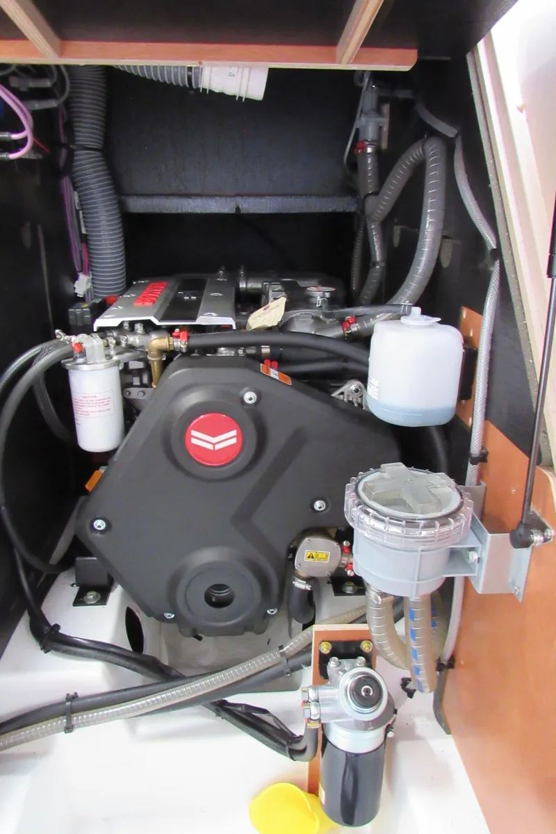 Slide: The Image of Engine compartment of a 2020 Beneteau Oceanis 46.1 sailboat, showcasing mechanical components. - 32