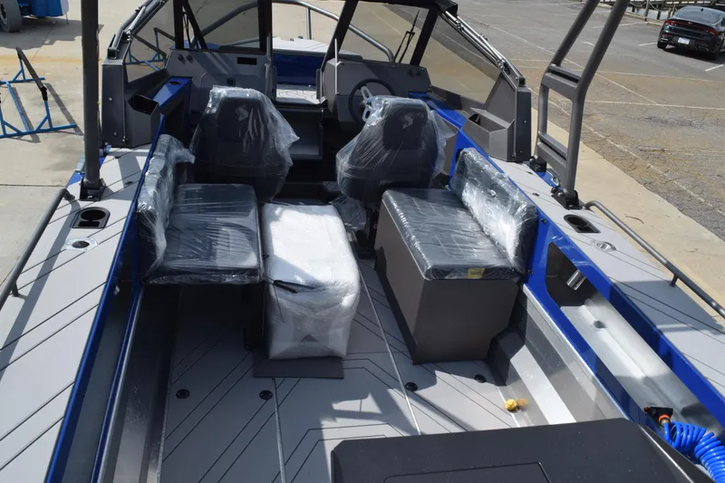 Slide: The Image of 2026 Stabicraft 2050 Treker Profish boat interior with covered seating and modern design. - 10