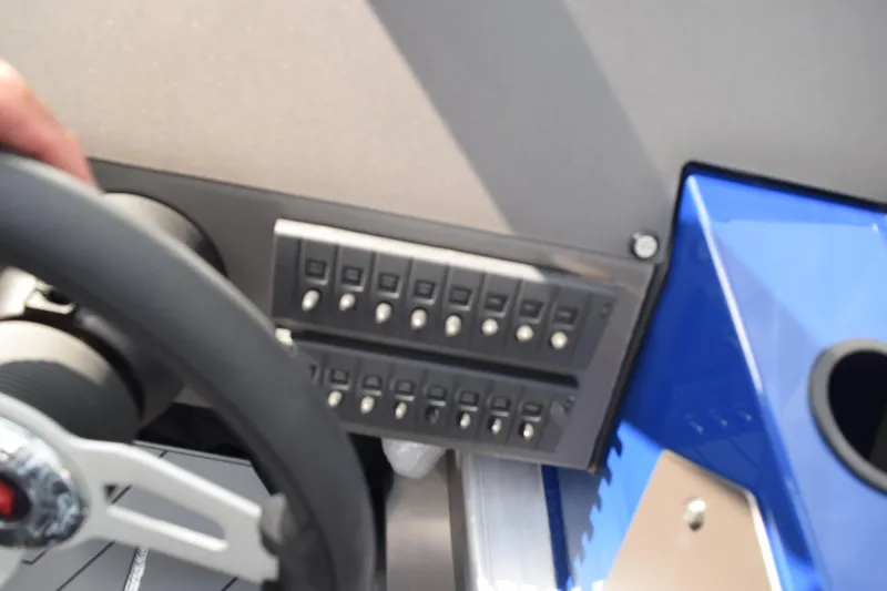 Slide: The Image of Control panel and steering wheel of 2026 Stabicraft 2050 Treker Profish boat. - 14