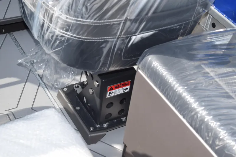 Slide: The Image of 2026 Stabicraft 2050 Treker Profish seat detail with protective plastic covering. - 17