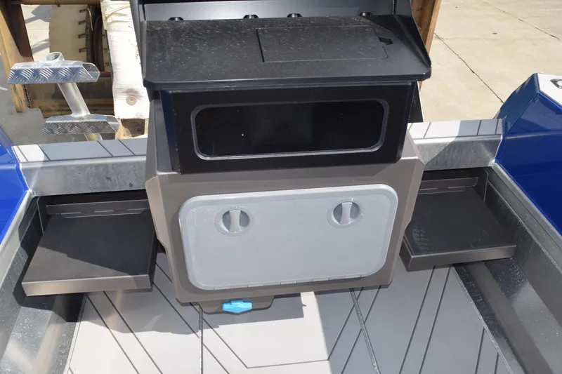 Slide: The Image of 2026 Stabicraft 2050 Treker Profish boat interior with storage compartments and sleek design. - 22