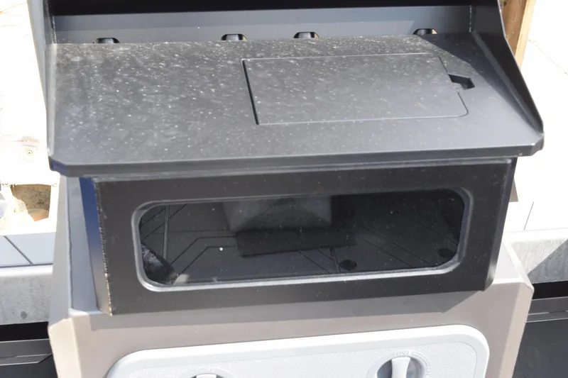 Slide: The Image of Stabicraft 2050 Treker Profish 2026 dashboard with storage compartment, featuring a sleek black design. - 23