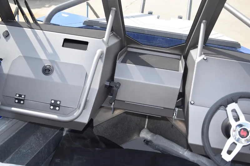Slide: The Image of Interior view of 2026 Stabicraft 2050 Treker Profish boat dashboard and steering wheel. - 29