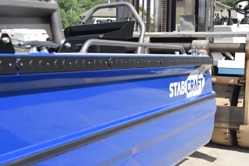 Slide: The Image of 2026 Stabicraft 2050 Treker Profish boat in vibrant blue, side view. - 7