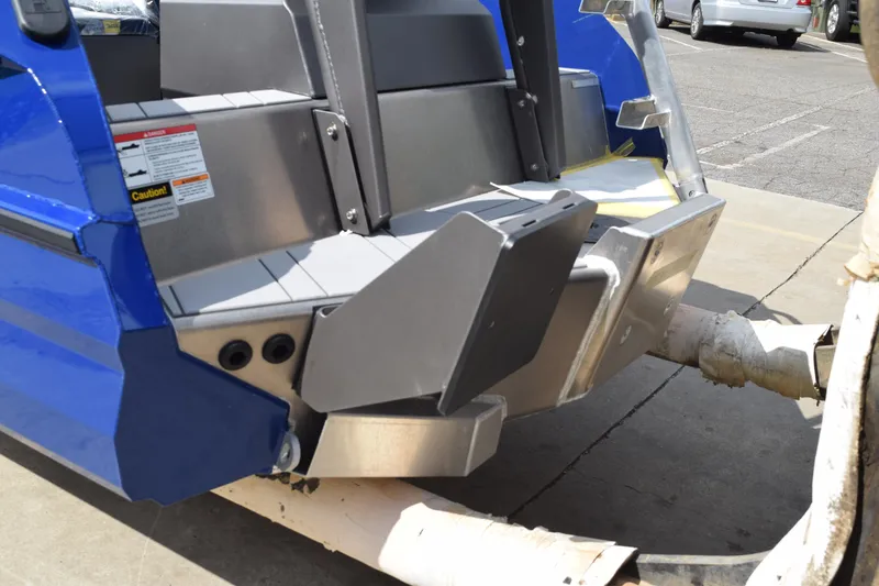 Slide: The Image of 2026 Stabicraft 2050 Treker Profish boat, blue exterior, rear view in parking lot. - 8