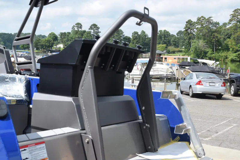 Slide: The Image of Stabicraft 2050 Treker Profish 2026 at marina, surrounded by boats and cars. - 9