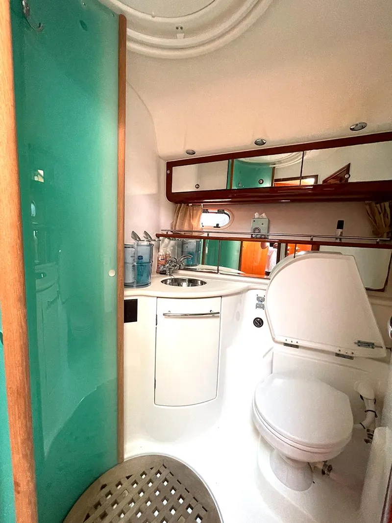 Slide: The Image of Luxurious bathroom in 2007 Jeanneau Prestige 46 yacht with modern fixtures and teal accents. - 23
