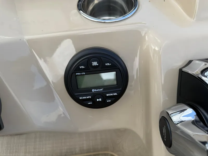 Slide: The Image of Control panel of 2023 Bentley Pontoons LE 200 with JBL Bluetooth audio system. - 14