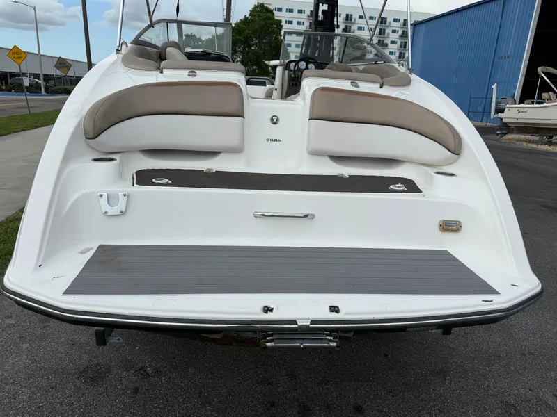 Slide: The Image of 2011 Yamaha Boats SX240 HO rear view, featuring spacious seating and swim platform. - 3