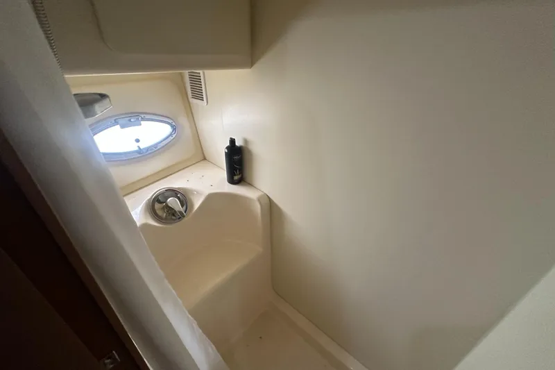 Slide: The Image of Bathroom interior of 2008 Silverton 35 Motor Yacht with porthole and shower. - 39