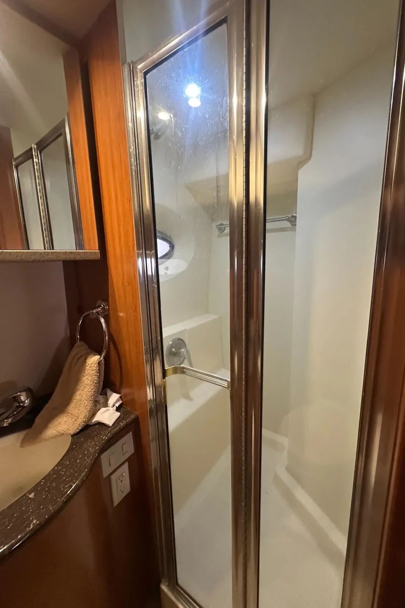 Slide: The Image of Bathroom interior of 2008 Silverton 35 Motor Yacht with shower and sink. - 48