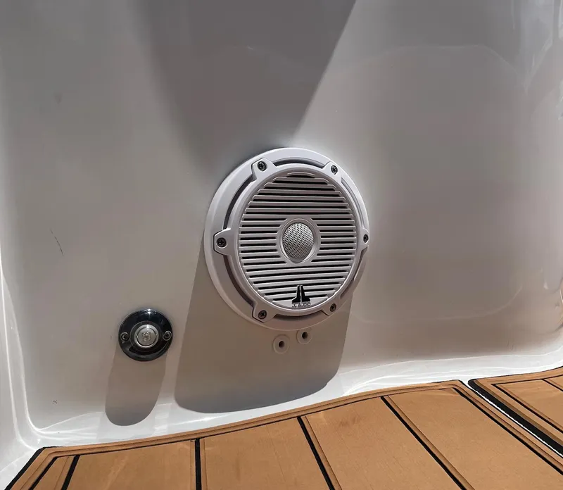 Slide: The Image of 2024 Sea Hunt Ultra 305 SE boat speaker and deck detail. - 23