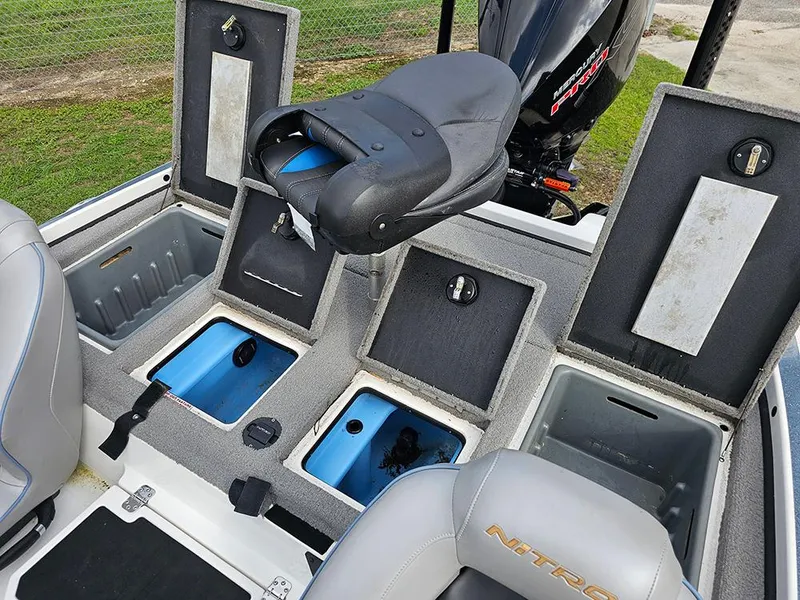 Slide: The Image of 2023 Nitro Z20 Pro boat interior with storage compartments and seating. - 11