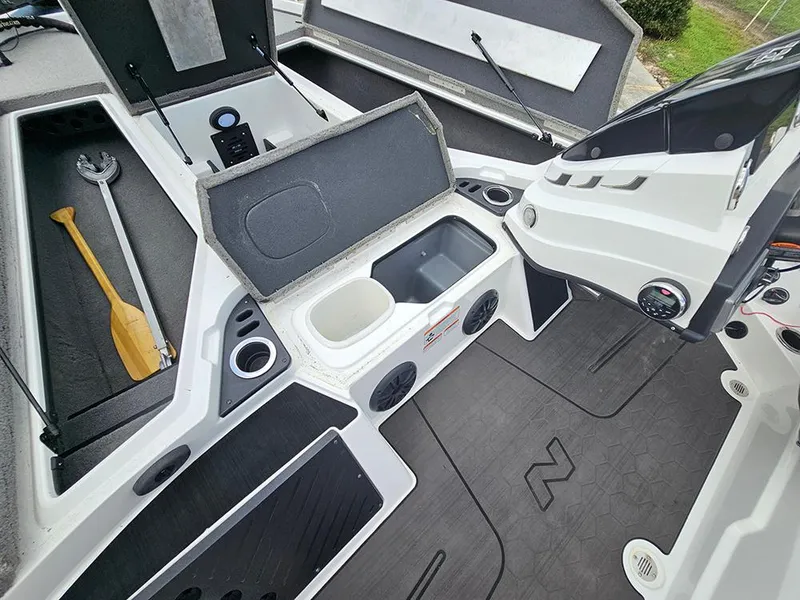 Slide: The Image of 2023 Nitro Z20 Pro boat interior with storage compartments and equipment. - 19