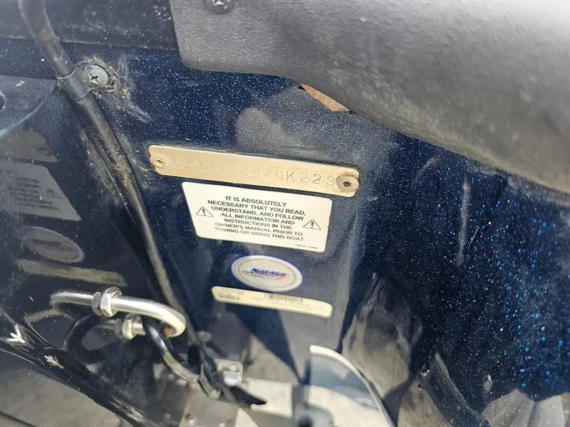 Slide: The Image of 2023 Nitro Z20 Pro boat identification plate with safety instructions and serial number. - 22