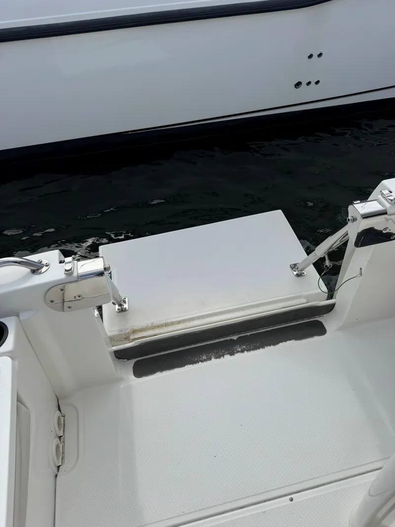 Slide: The Image of 2017 Boston Whaler 270 Dauntless swim platform with stainless steel fittings. - 6