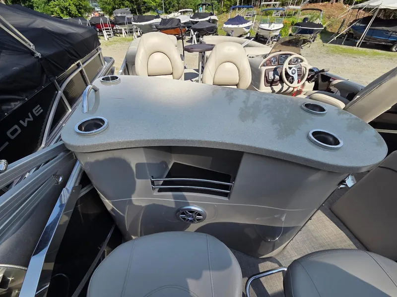 Slide: The Image of Pontoon boat interior with bar counter and cup holders, South Bay 523, 2018 model. - 12