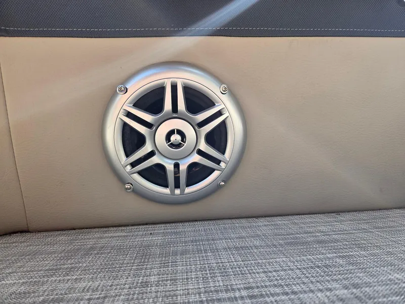 Slide: The Image of Speaker on a 2018 South Bay 523 boat, mounted on beige upholstery. - 16