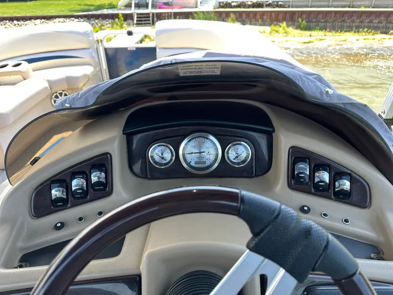 Slide: The Image of Dashboard of a 2012 Bennington 2275 GS boat with gauges and controls. - 20
