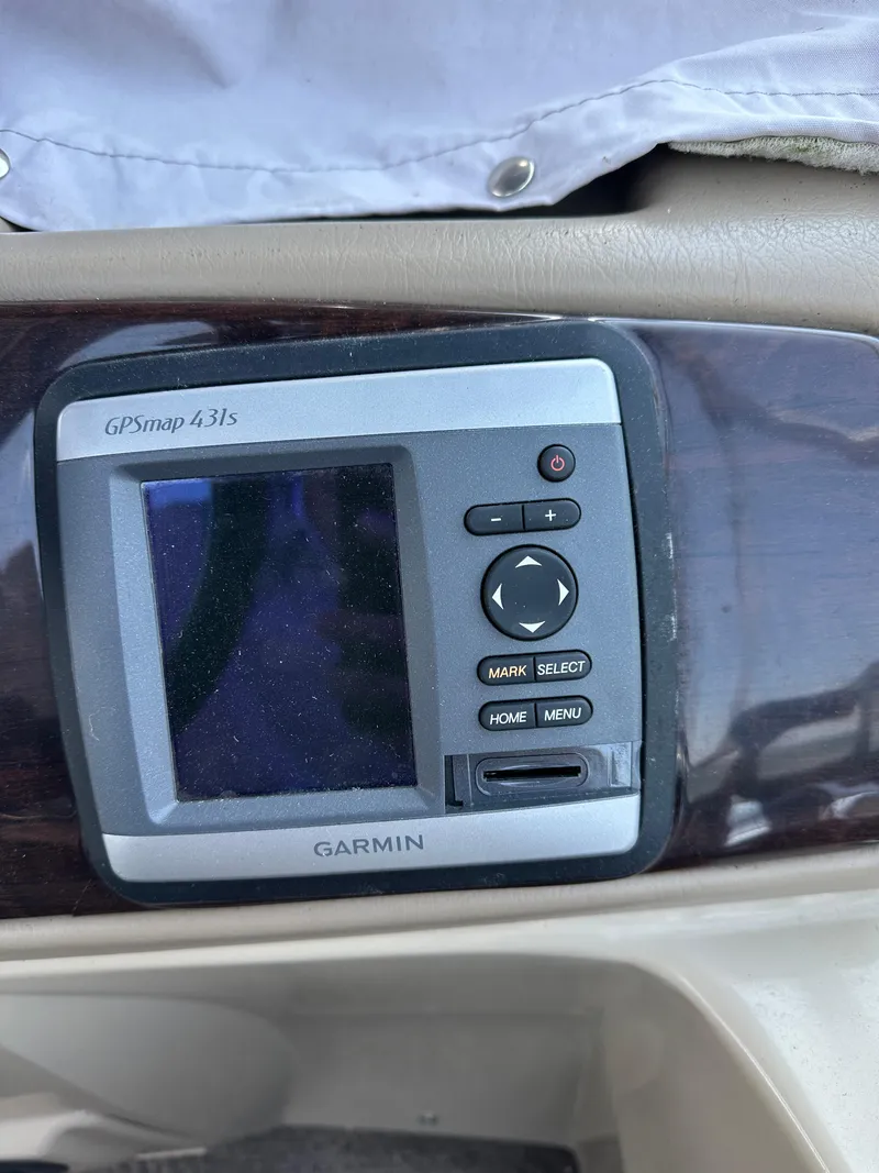 Slide: The Image of Garmin GPSmap 431s device on a 2012 Bennington 2275 GS boat dashboard. - 22