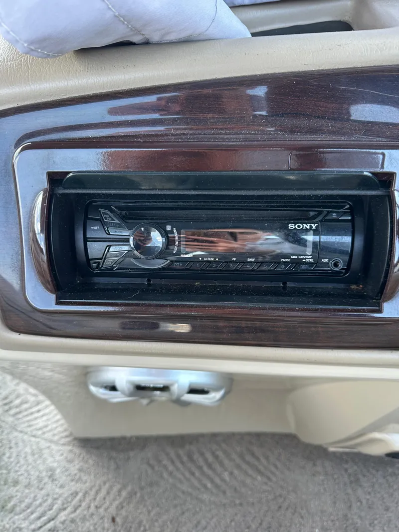 Slide: The Image of Sony stereo system in a 2012 Bennington 2275 GS boat dashboard. - 23