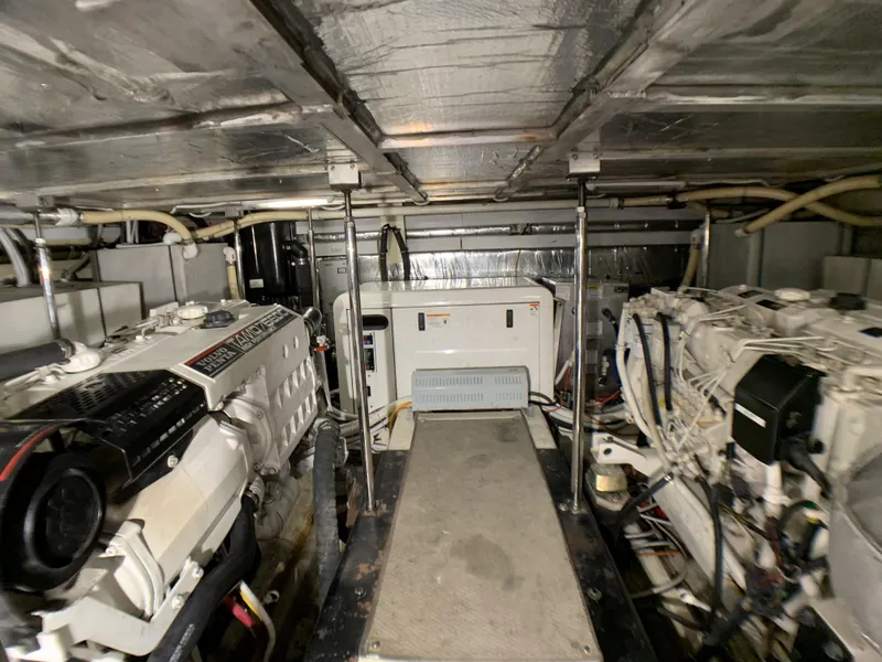 Slide: The Image of Engine room of a 2006 Carver 56 Voyager yacht with twin engines. - 31
