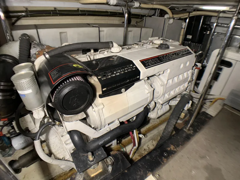 Slide: The Image of 2006 Carver 56 Voyager engine compartment with Volvo Penta engine. - 33