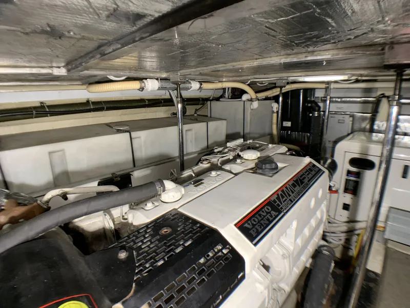 Slide: The Image of Engine room of a 2006 Carver 56 Voyager yacht with Volvo Penta engine. - 34