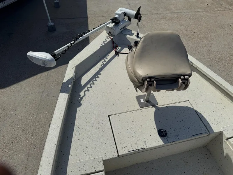 Slide: The Image of 2017 Xpress H20B boat deck with seat and trolling motor. - 13