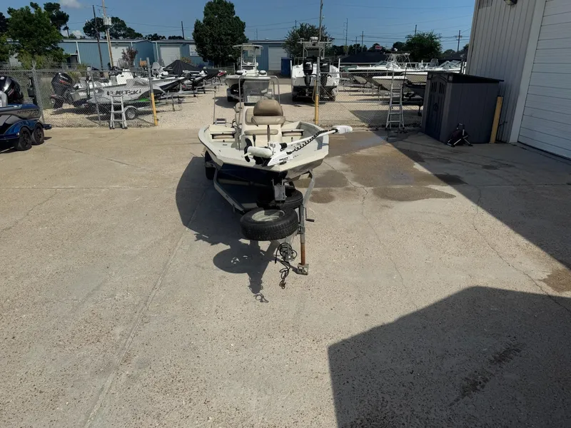 Slide: The Image of 2017 Xpress H20B boat on trailer in outdoor storage lot. - 3