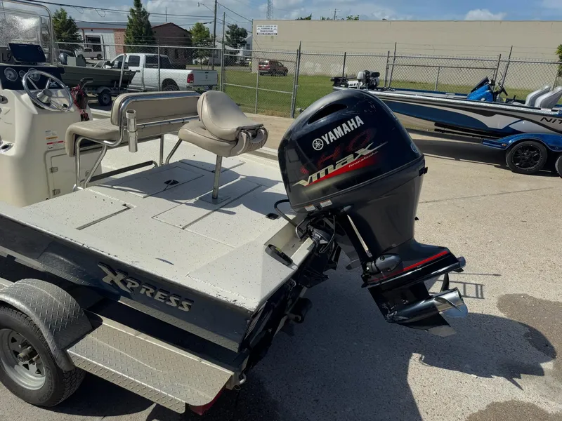 Slide: The Image of 2017 Xpress H20B boat with Yamaha VMAX outboard motor on trailer. - 9