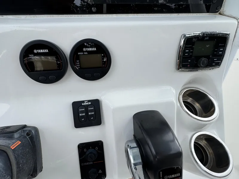 Slide: The Image of Control panel of 2017 Tidewater 230 CC Adventure boat with Yamaha gauges and Polk audio system. - 10