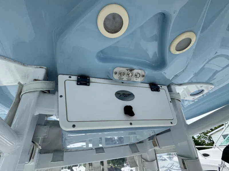 Slide: The Image of 2017 Tidewater 230 CC Adventure boat console with speakers and control panel. - 8