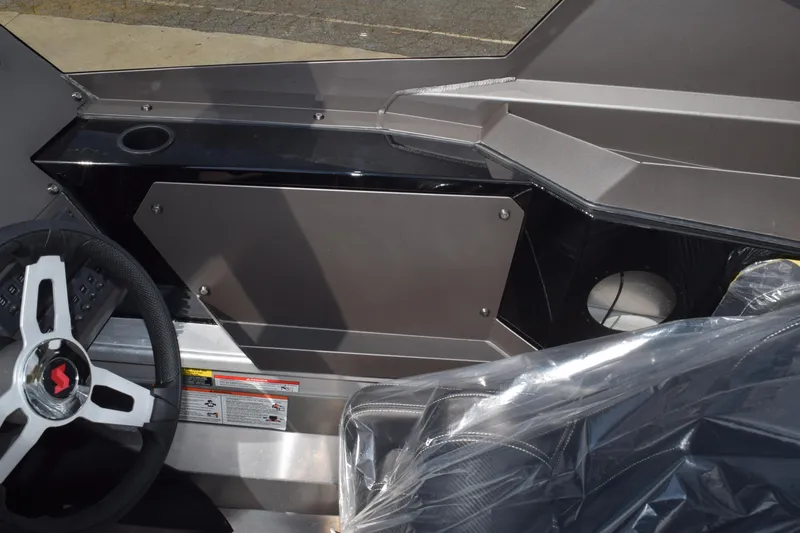 Slide: The Image of 2026 Stabicraft 2050 Treker Sportfish interior with steering wheel and dashboard details. - 11