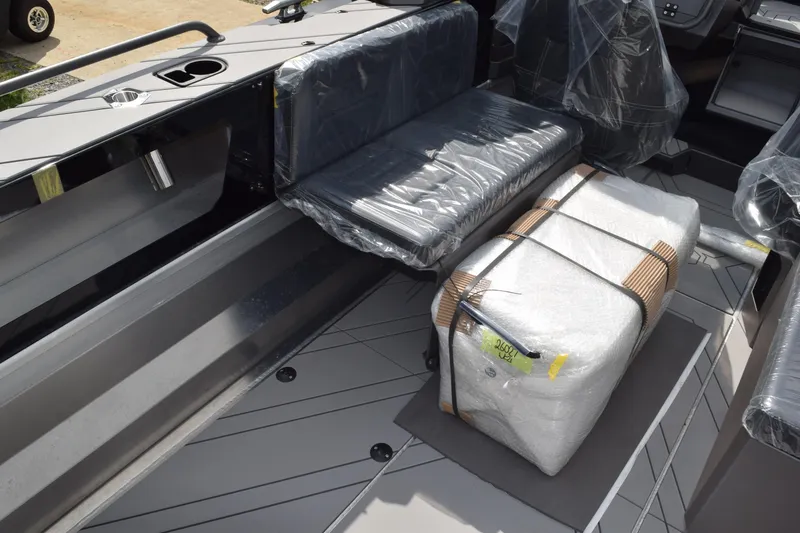 Slide: The Image of 2026 Stabicraft 2050 Treker Sportfish interior with wrapped seating and equipment. - 14