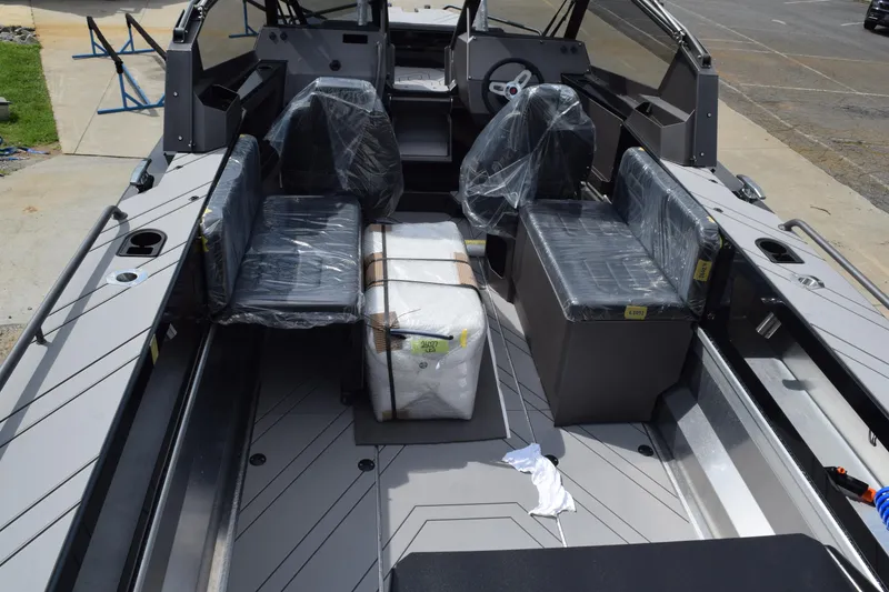 Slide: The Image of 2026 Stabicraft 2050 Treker Sportfish interior with plastic-covered seats and modern design. - 6